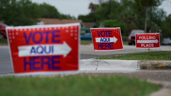 Voting signs are displayed outside a polling site during a special election to fill the vacant 34th congressional district seat in Los Fresnos