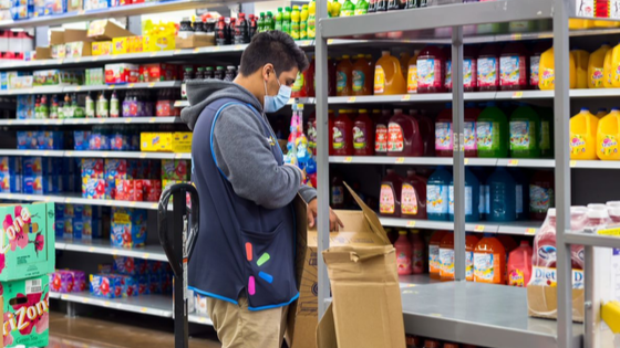 Walmart worker stocks shelves