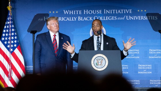 White House Opportunity and Revitalization Council Executive Director Scott Turner speaks alongside President Donald Trump