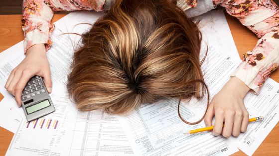 Woman trying to fill out tax forms