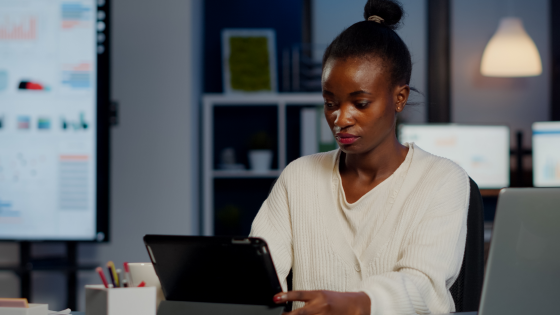 Woman working on tablet device