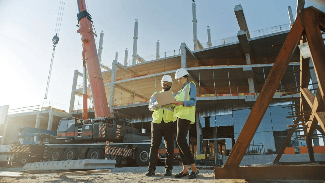 Workers wearing safety gear at a construction site