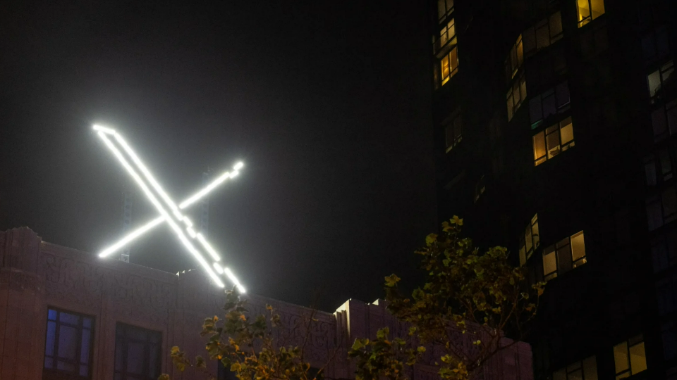 X logo seen at the top of a building in San Francisco, California