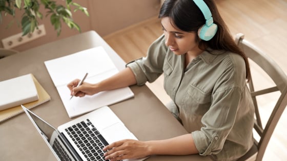 Young girl takes part in online virtual tutoring