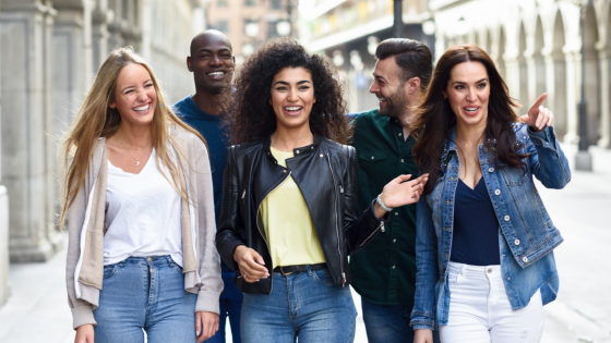 Young people walk together in city