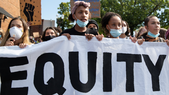 Young protesters march for justice system reform and equity in education in Portland