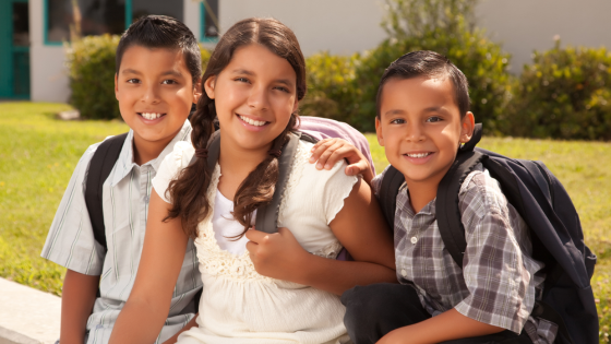 Young students pose for camera