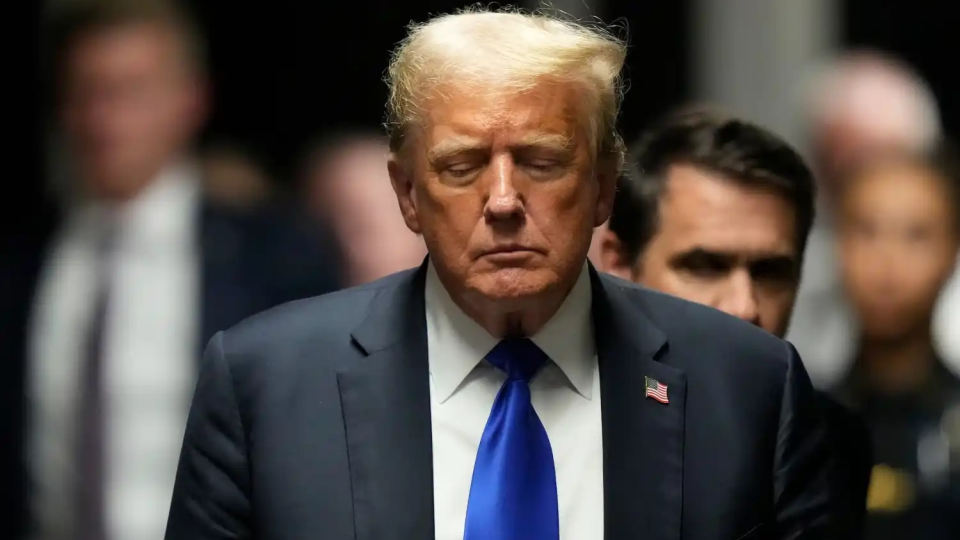 _Former President Donald Trump walks to make comments to members of the media after being found guilty on 34 felony counts in Manhattan criminal court.